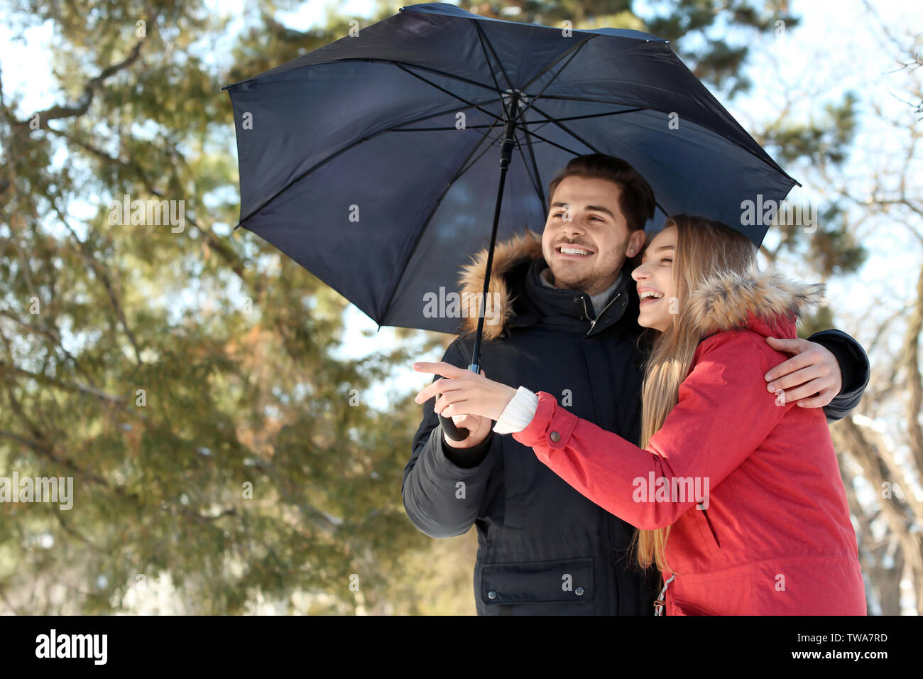 Loving couple in rain umbrella hi-res stock photography and images - Alamy