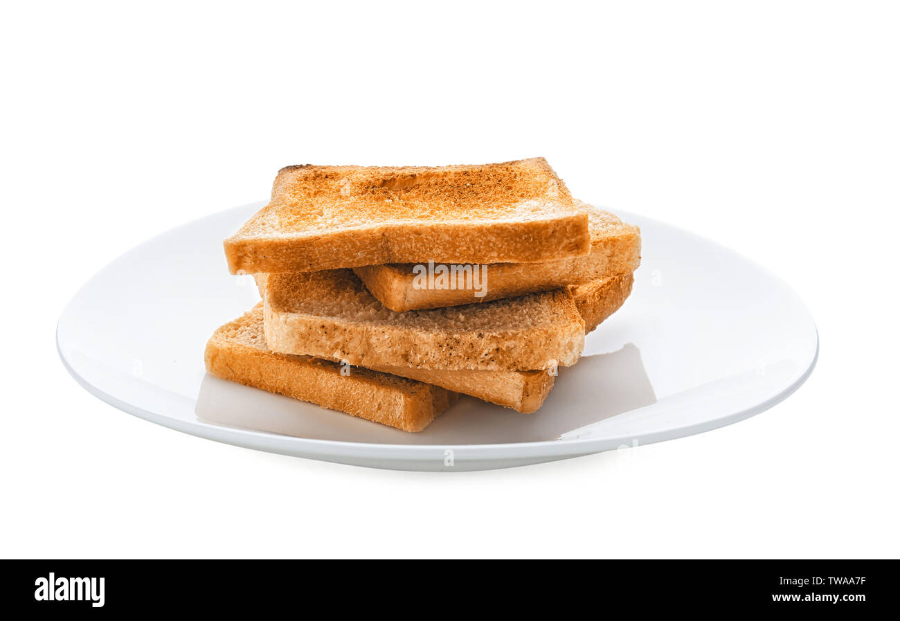 Plate with toasted bread on white background Stock Photo - Alamy