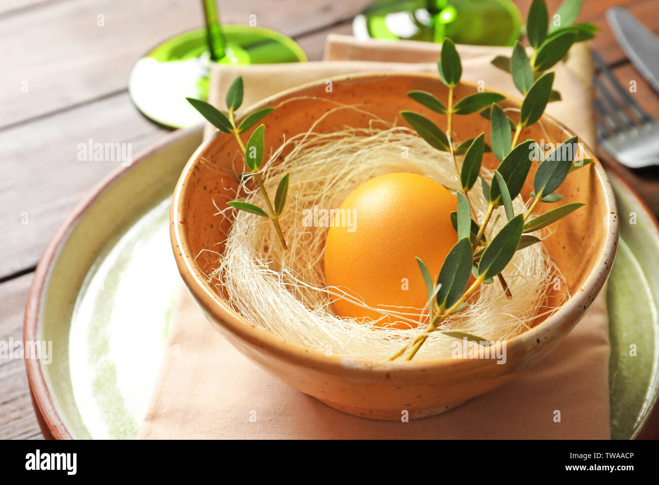 Beautiful festive Easter table setting with painted egg, closeup Stock Photo