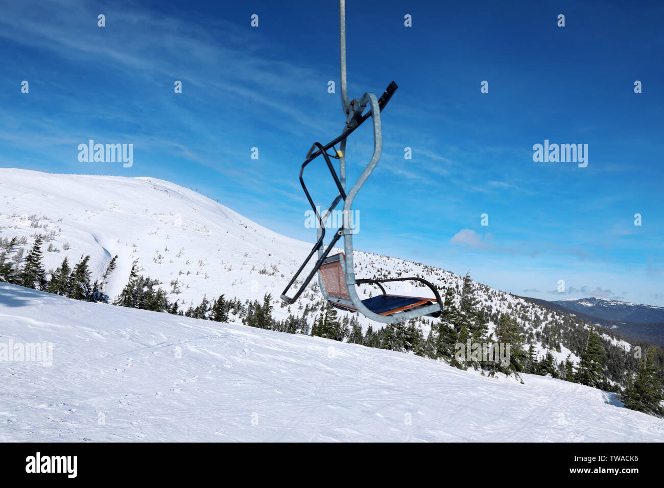 Ski lift at snowy resort in mountains. Winter vacation Stock Photo - Alamy