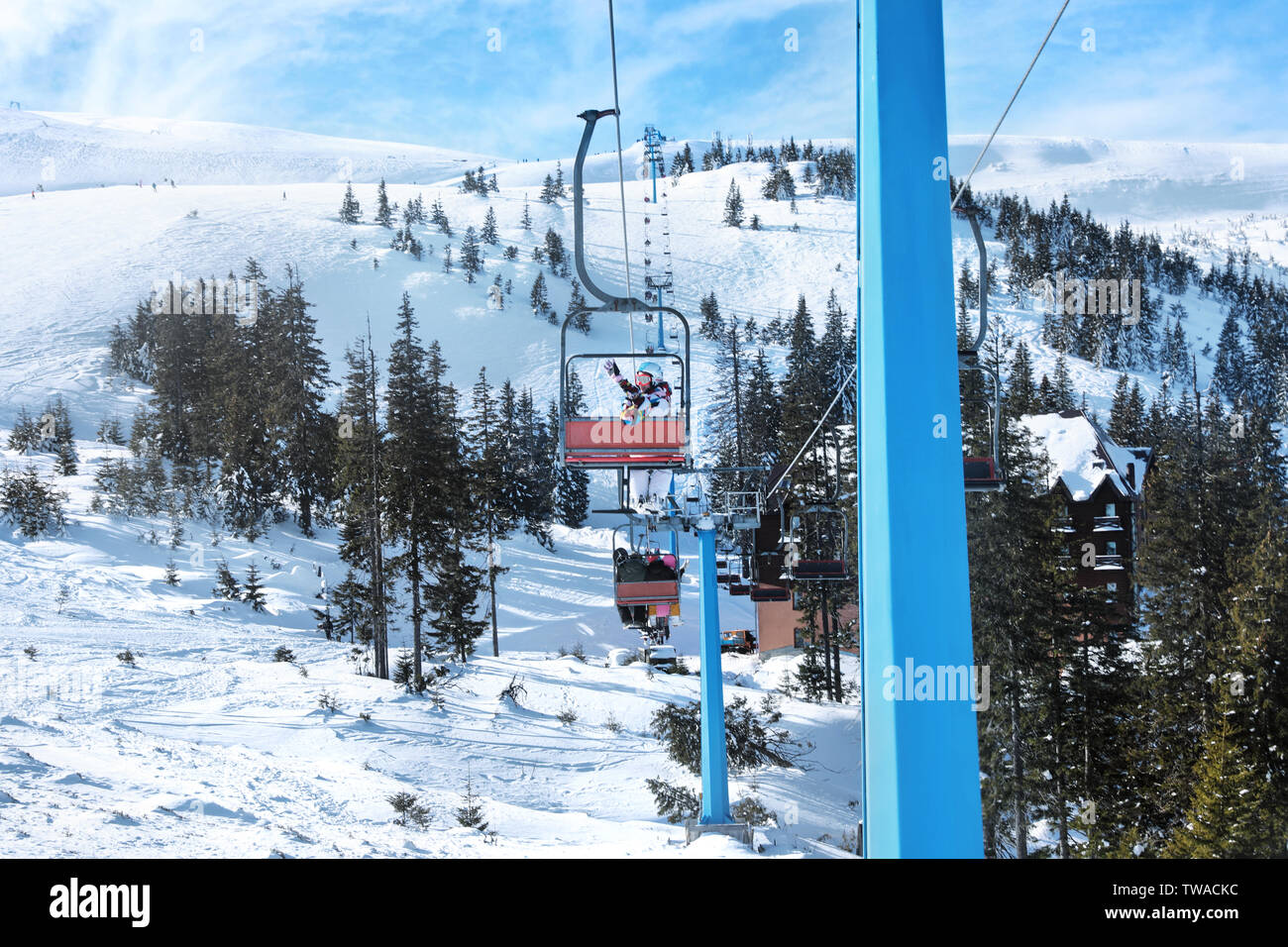 Ski lift at snowy resort in mountains. Winter vacation Stock Photo - Alamy