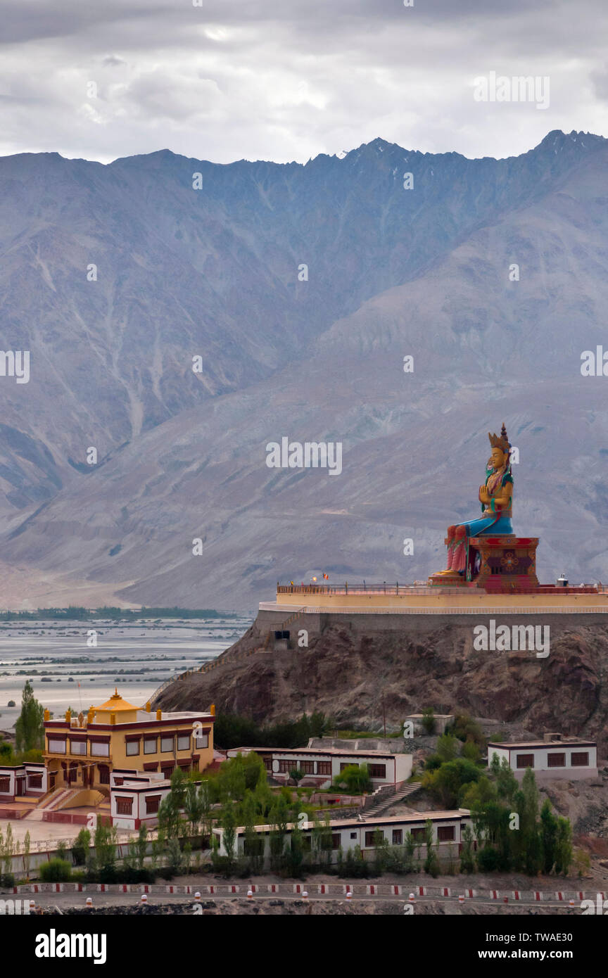 Long shot of Maitreya Buddha at Diskit Monastery, Nubra Valley, Ladakh, Jammu and Kashmir, India. Stock Photo