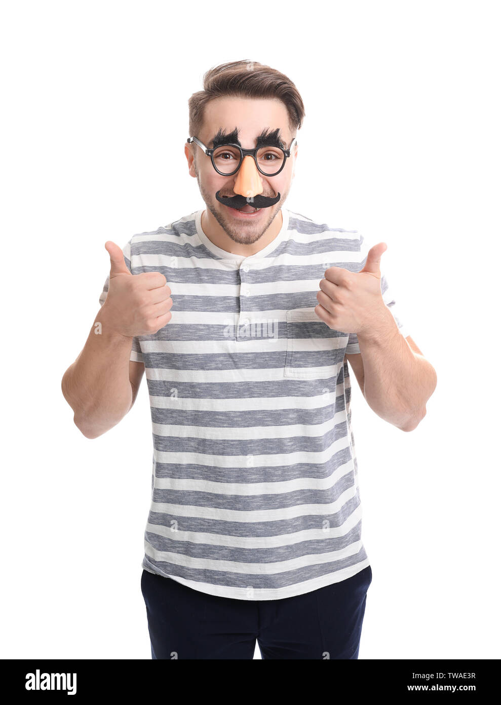young-man-in-funny-glasses-on-white-background-april-fools-day-celebration-TWAE3R.jpg