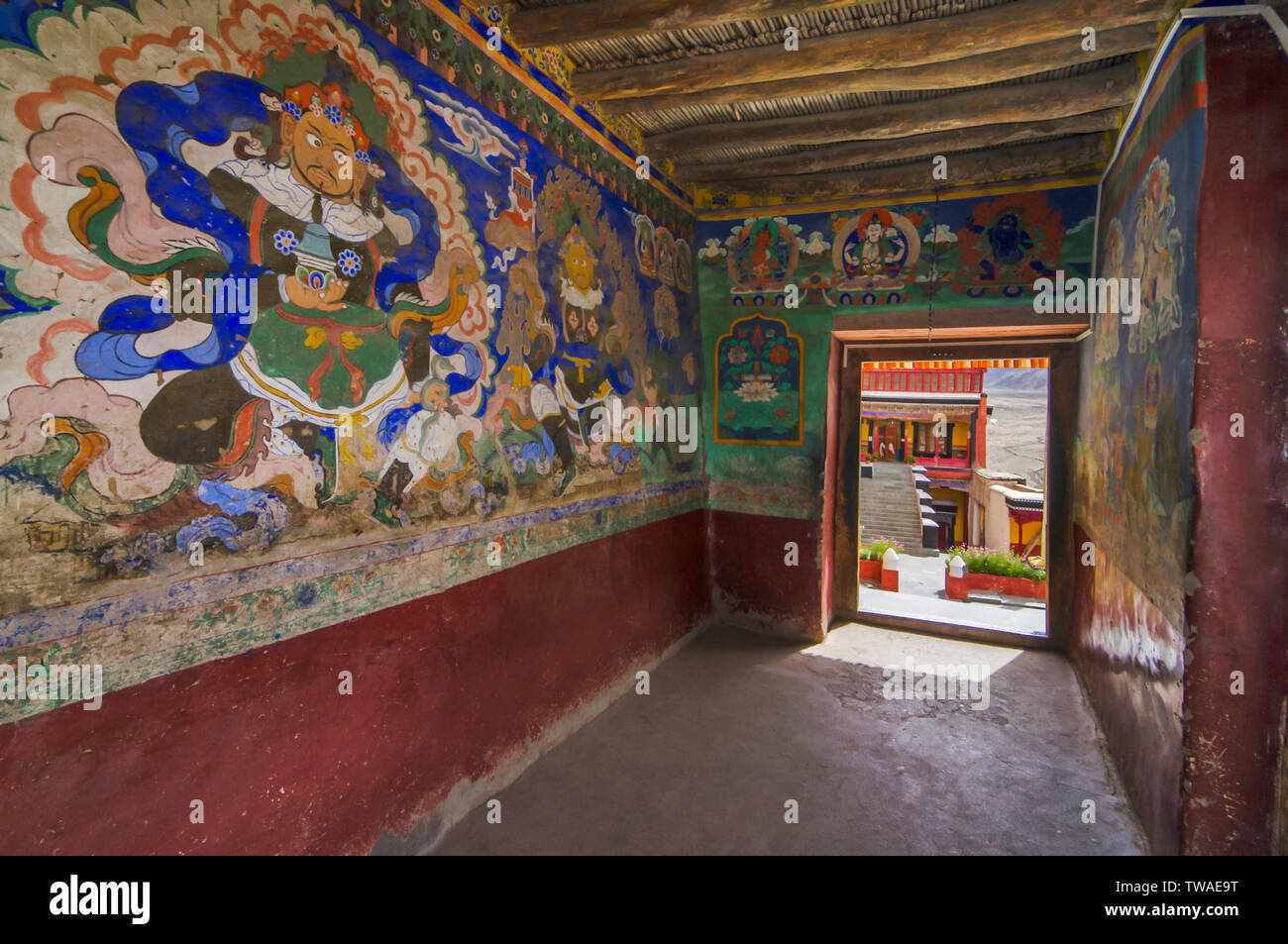 Paintings on the wall at Thiksey Monastery or Thiksey Gompa passage, Ladakh, India. Stock Photo