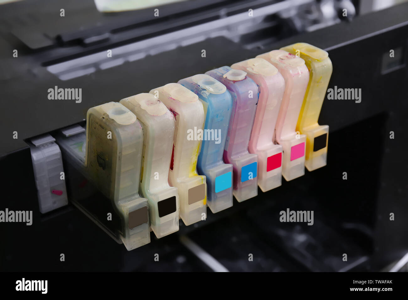 Cartridges with paints for modern printing machine Stock Photo - Alamy
