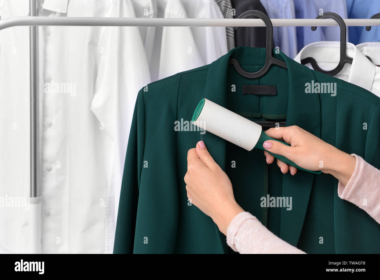 Woman removing clothes hires stock photography and images Alamy