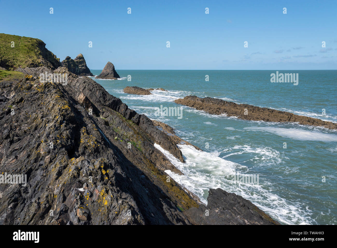 Rugged coastline at Ceibwr Bay near Cardigan in the Pembrokeshire coast national park. Stock Photo