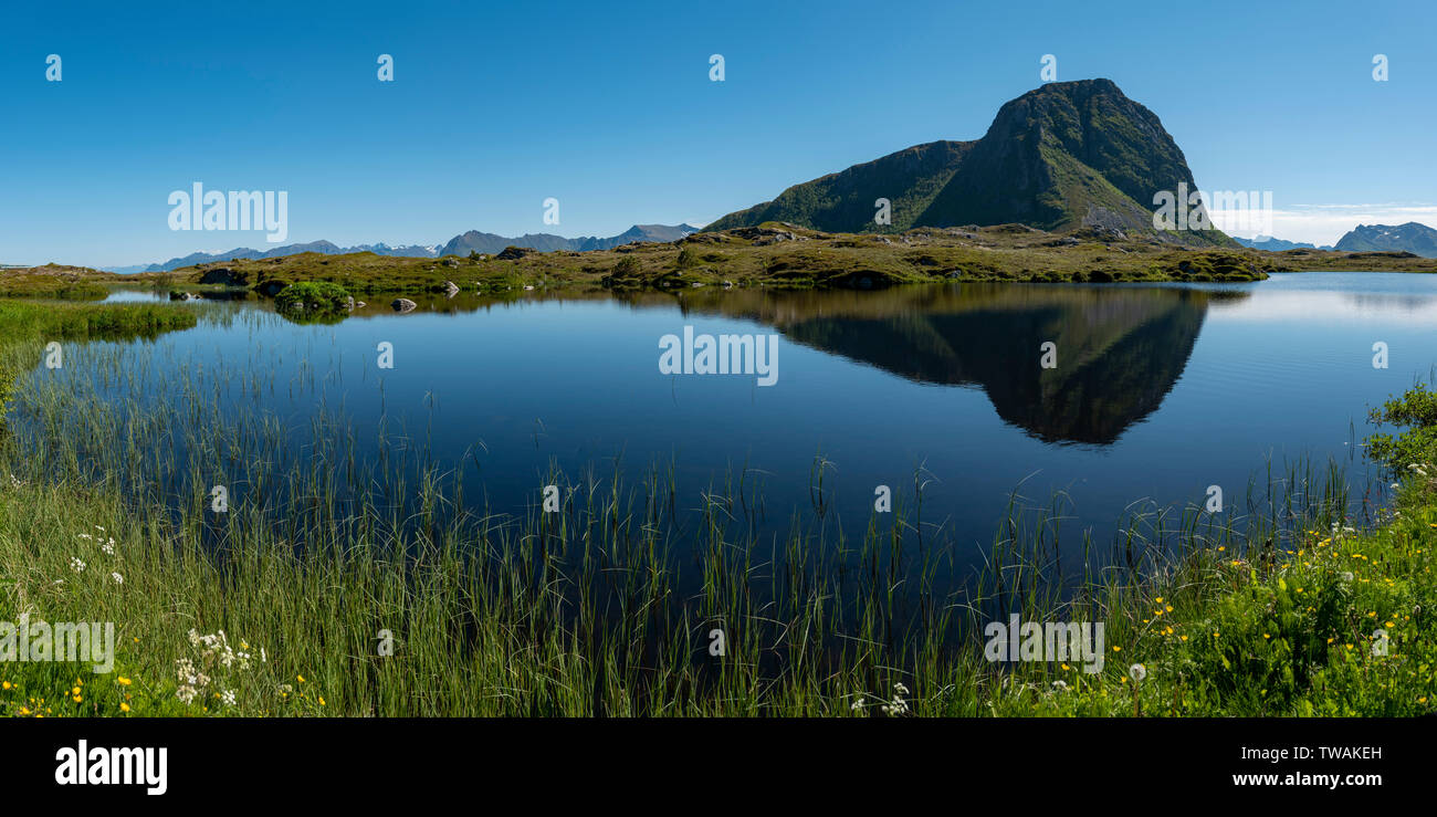 Hoven reflection near Hov, Lofoten Islands, Norway. Stock Photo