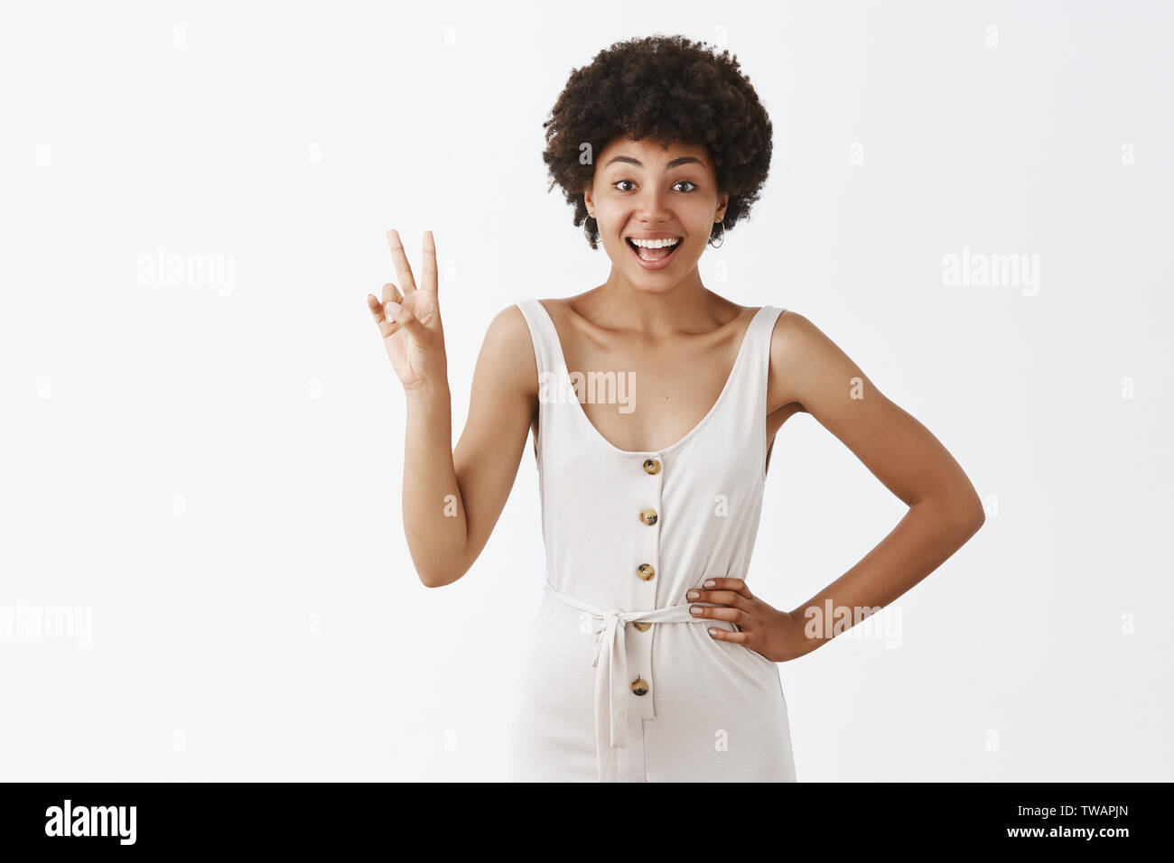 Joyful Good Looking African American Feminine Girl With Afro