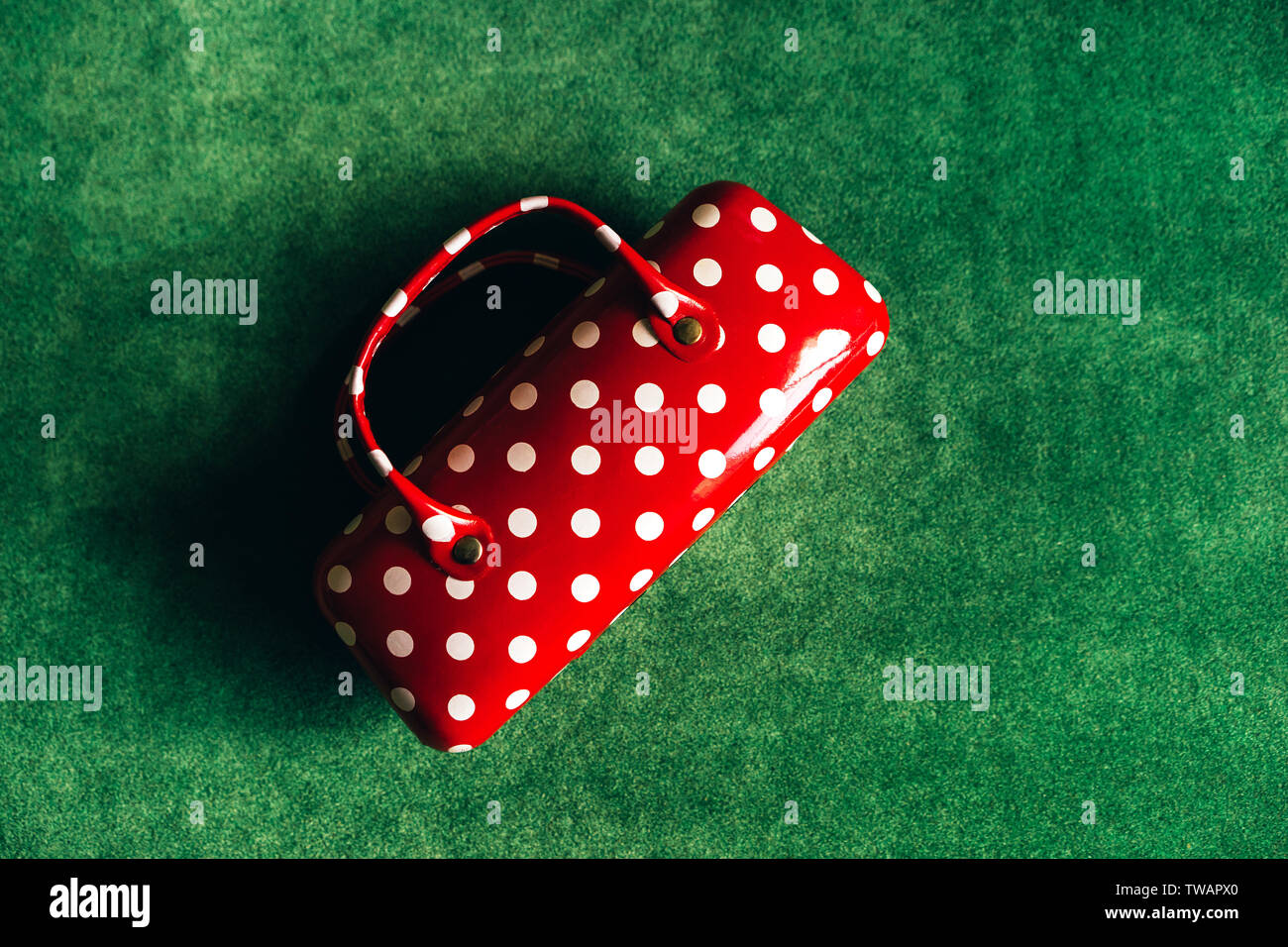Case for glasses in the form of a women's handbag red with white polka dots Stock Photo Alamy