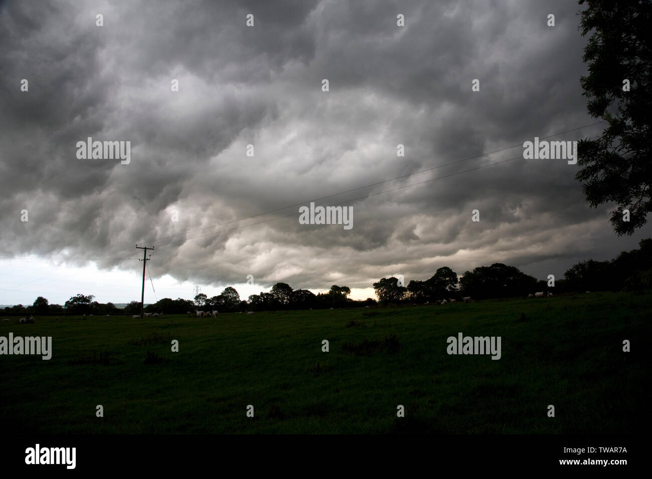 Dark rain clouds from Storm Miguel looming over Meon Hill near Mickleton, Chipping Campden, UK Stock Photo