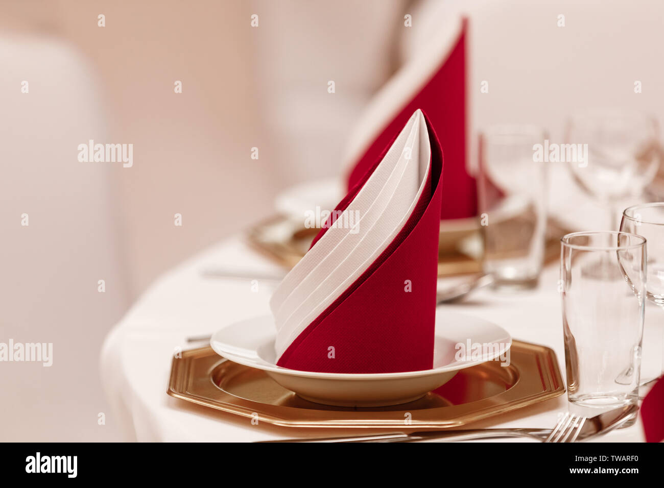 napkins in the interior. Round Banquet table served. Interior of