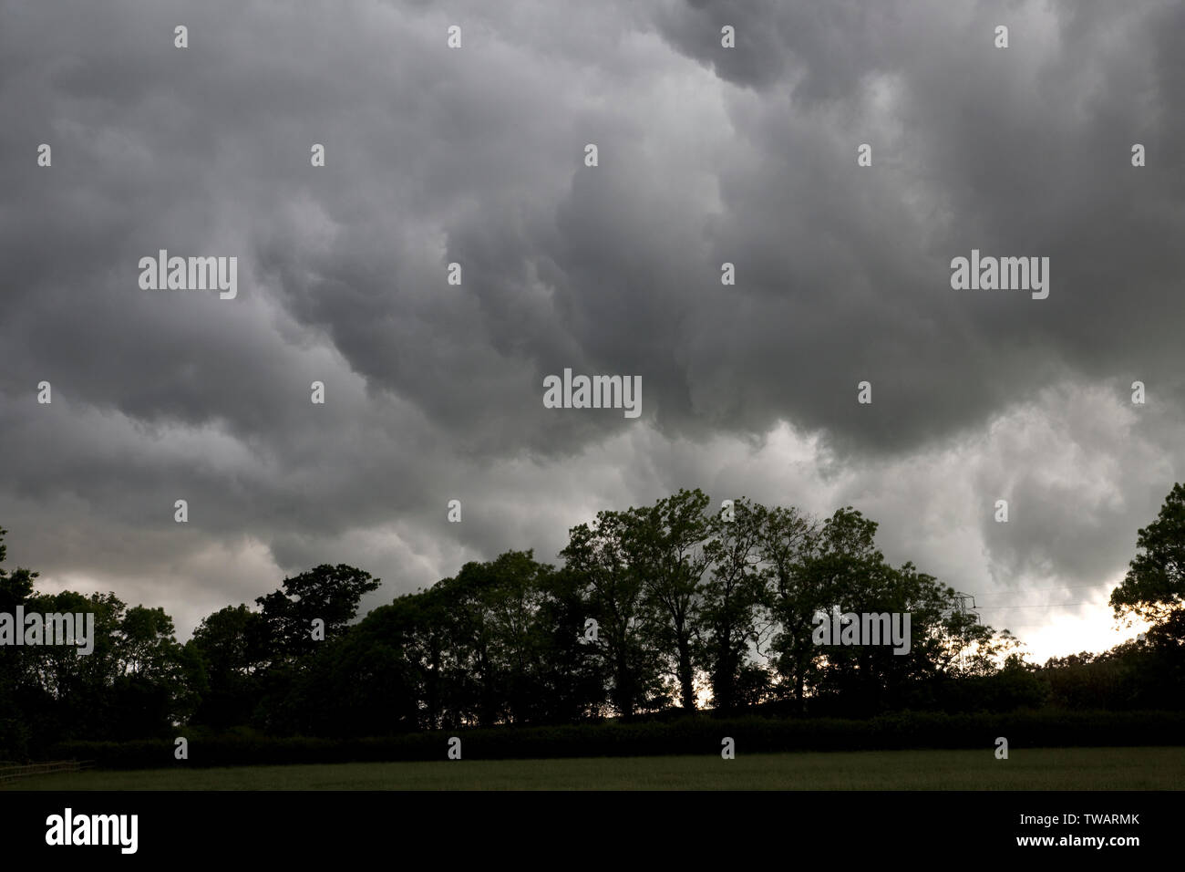 Dark rain clouds from Storm Miguel looming over Meon Hill near Mickleton, Chipping Campden, UK Stock Photo