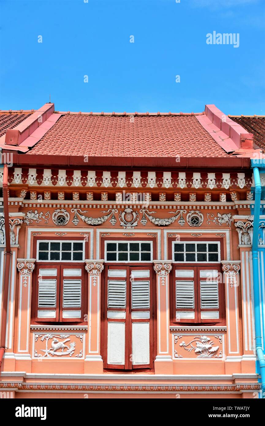 Front view of colourful traditional Singapore Peranakan or Straits Chinese shophouse in historic Joo Chiat East Coast Singapore Stock Photo