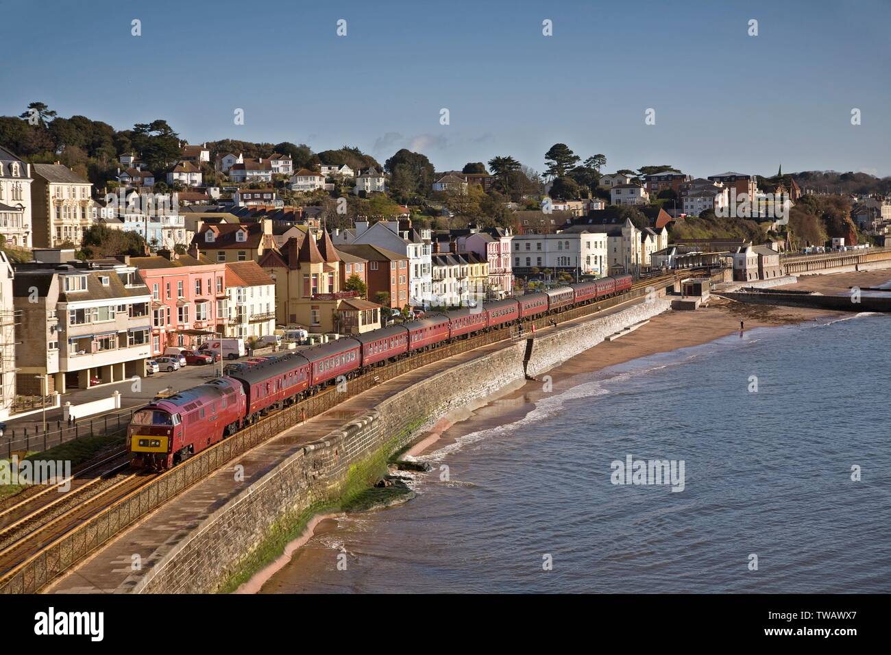 Great Britain, England, Western D1015 Western Champion passing Dawlish with a Bris. Stock Photo
