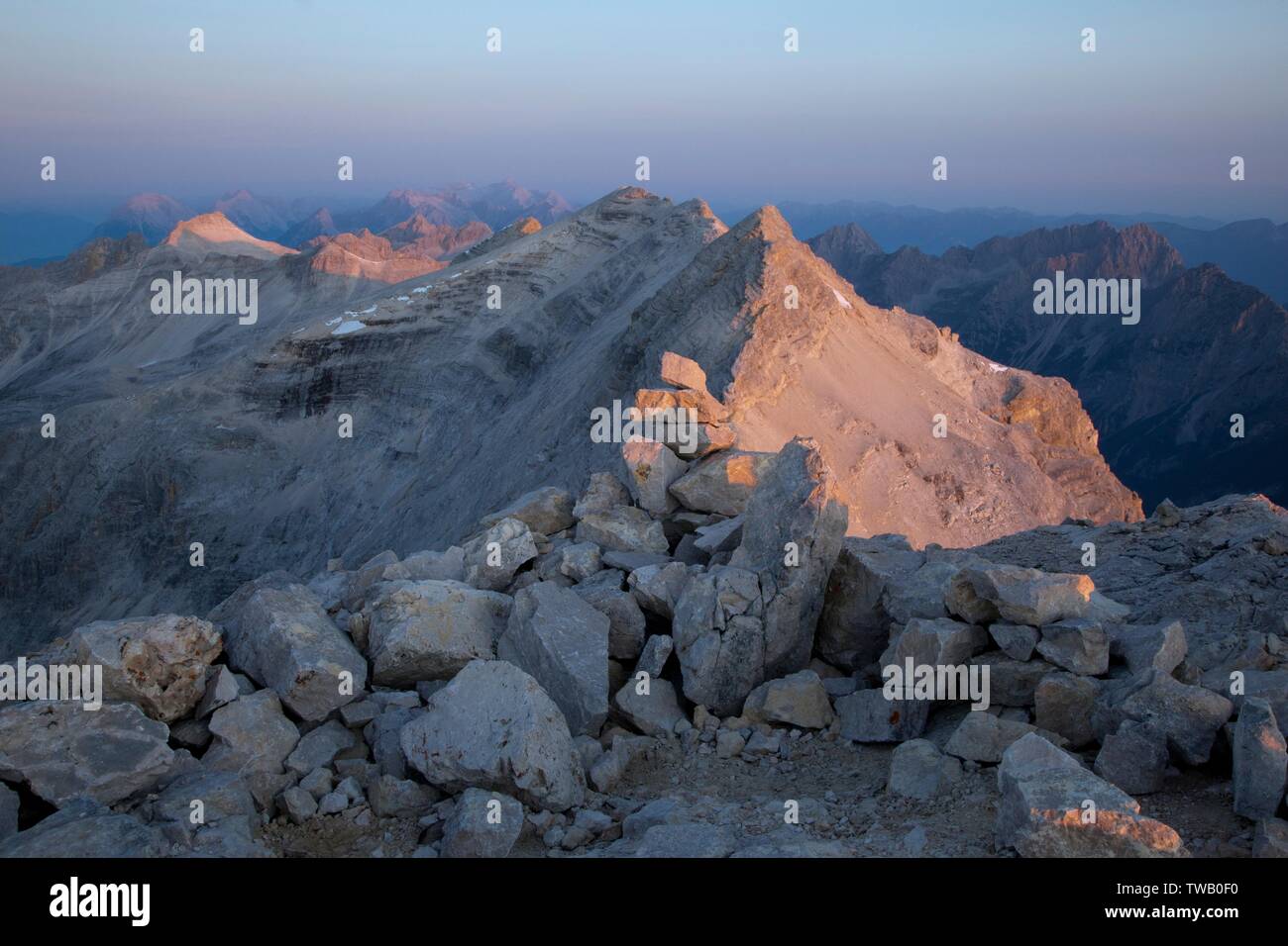 Austria, Tyrol, Karwendel Mountains, Birkkarspitze (peak) in the morning light. Stock Photo