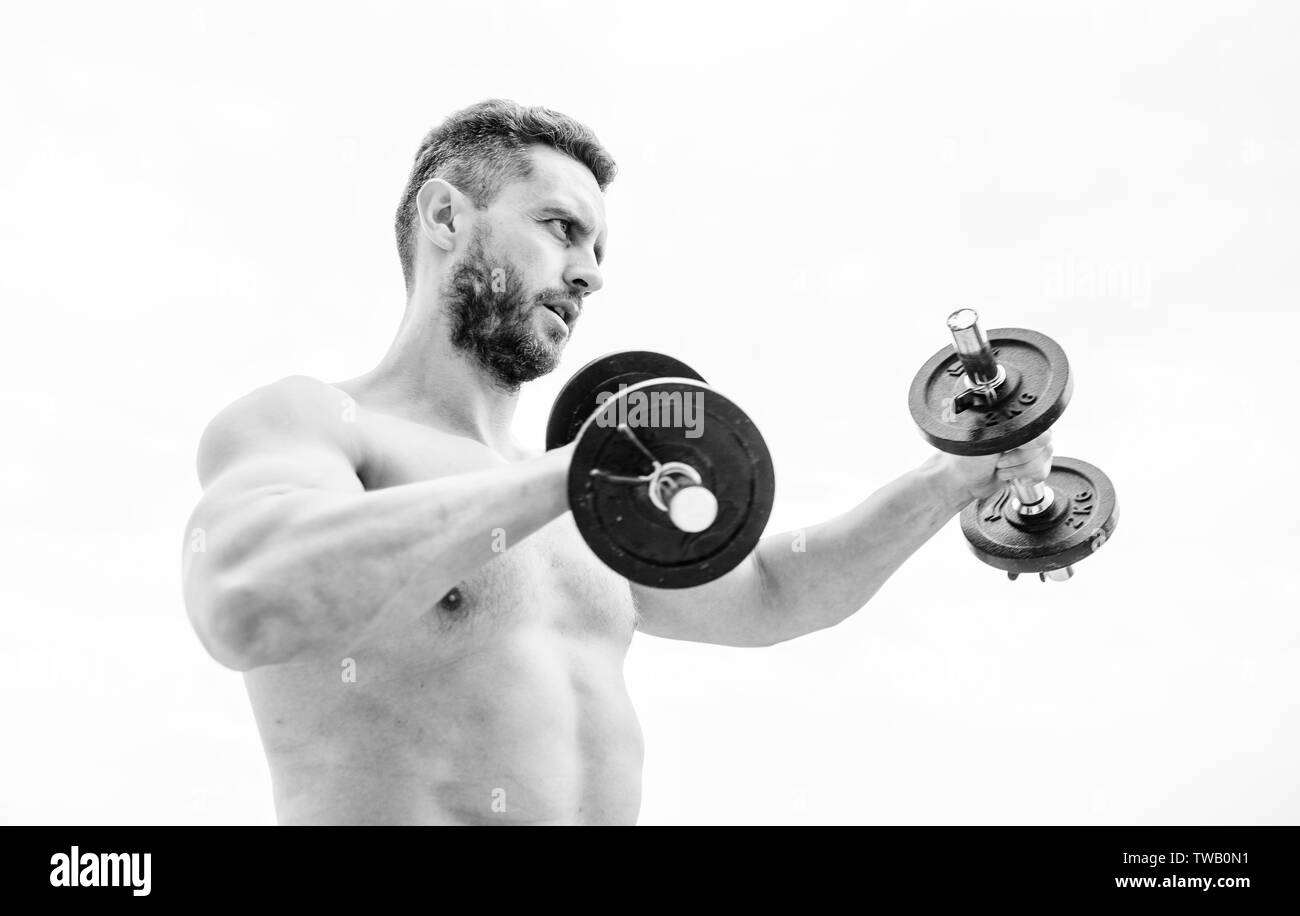 Training to be the best. success. Perfect biceps. fitness and sport equipment. man sportsman