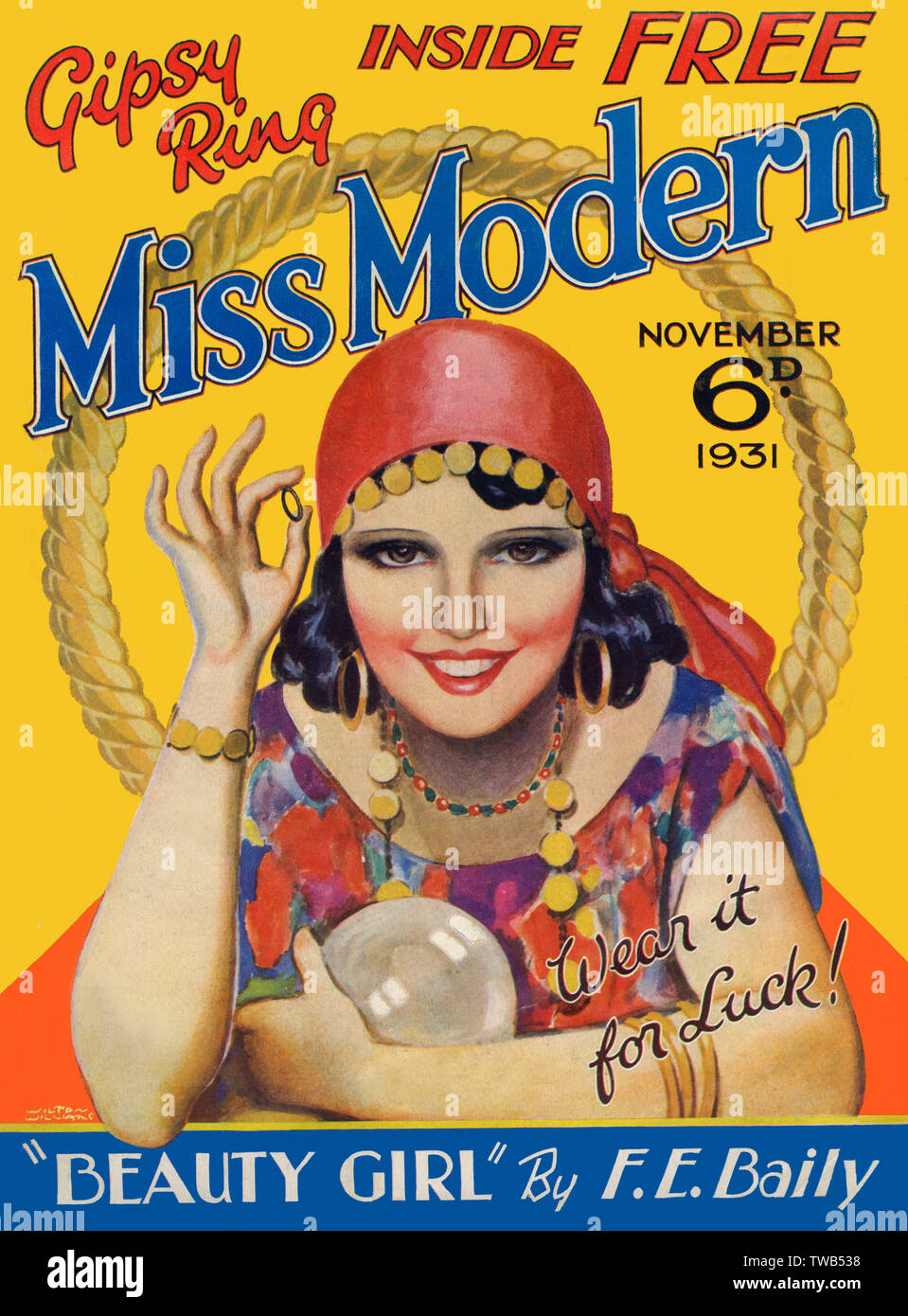 Front cover of Miss Modern magazine for November 1931, featuring a young gipsy fortune teller with a crystal ball (and the free gipsy ring, found FREE inside the magazine!).     Date: 1931 Stock Photo