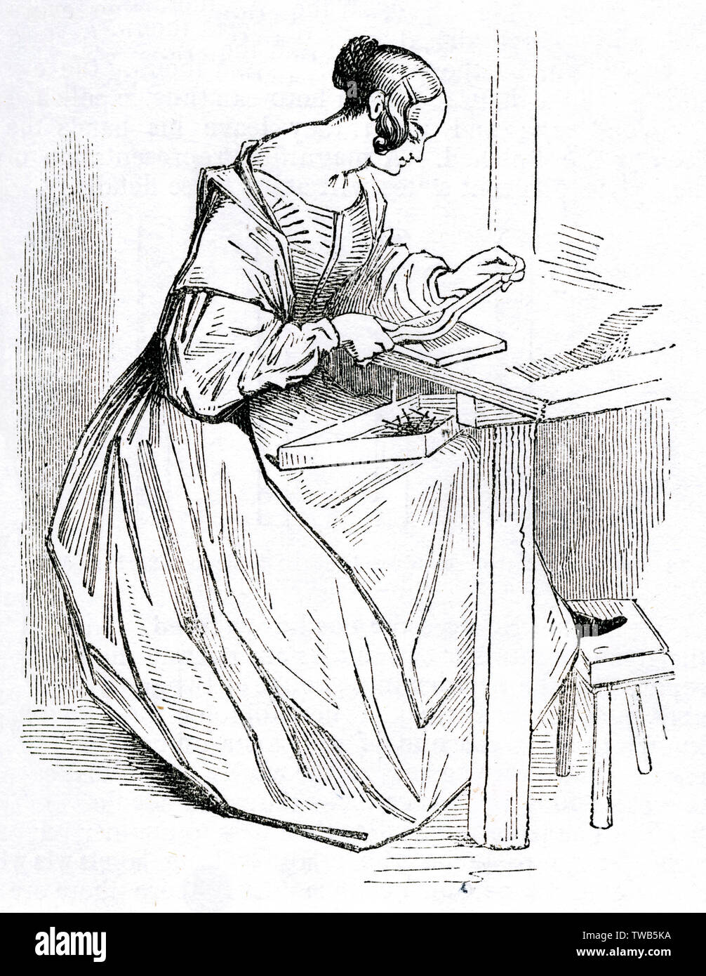 Scene at the British Needle Mills, Redditch, Worcestershire woman