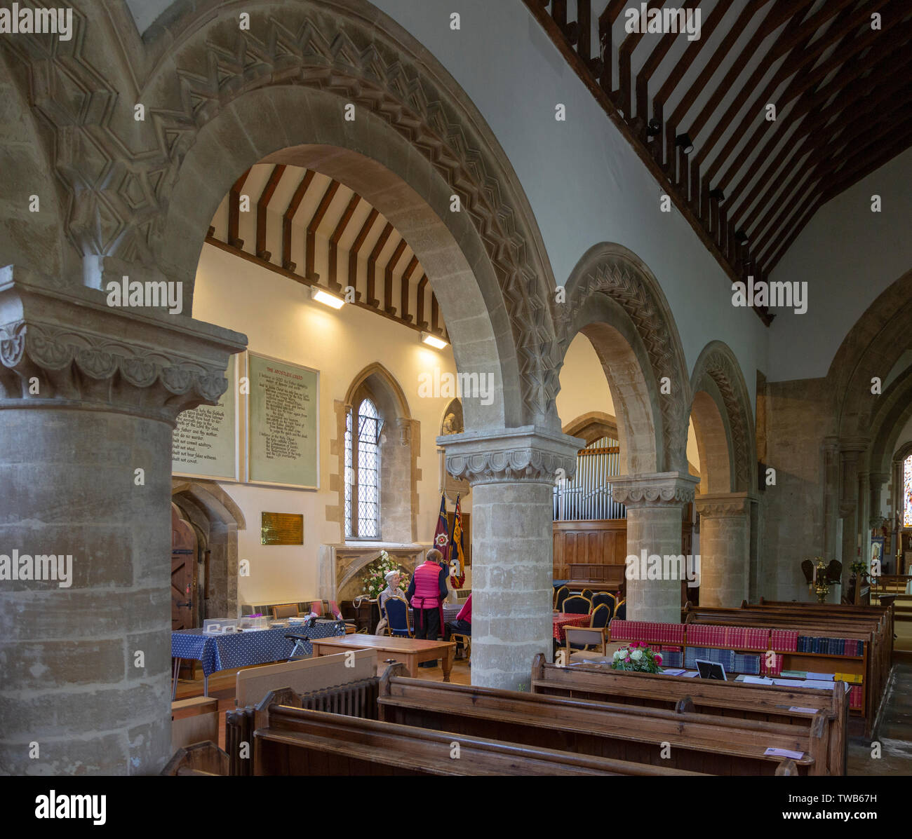 Norman arches inside village parish church of the Holy Cross, Sherston