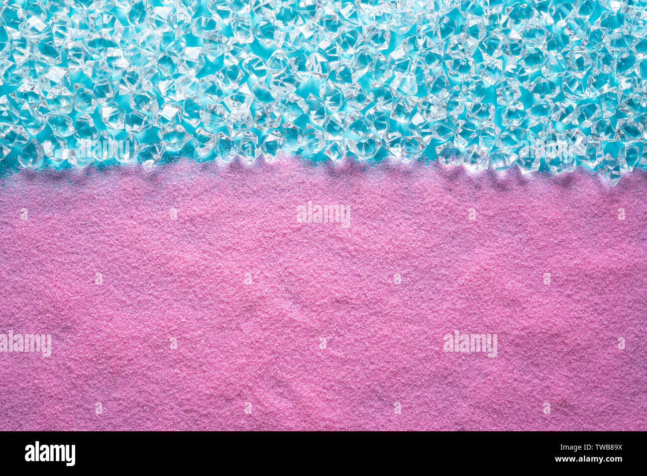 Pink beach sand background with aqua turquoise water abstract concept background Stock Photo