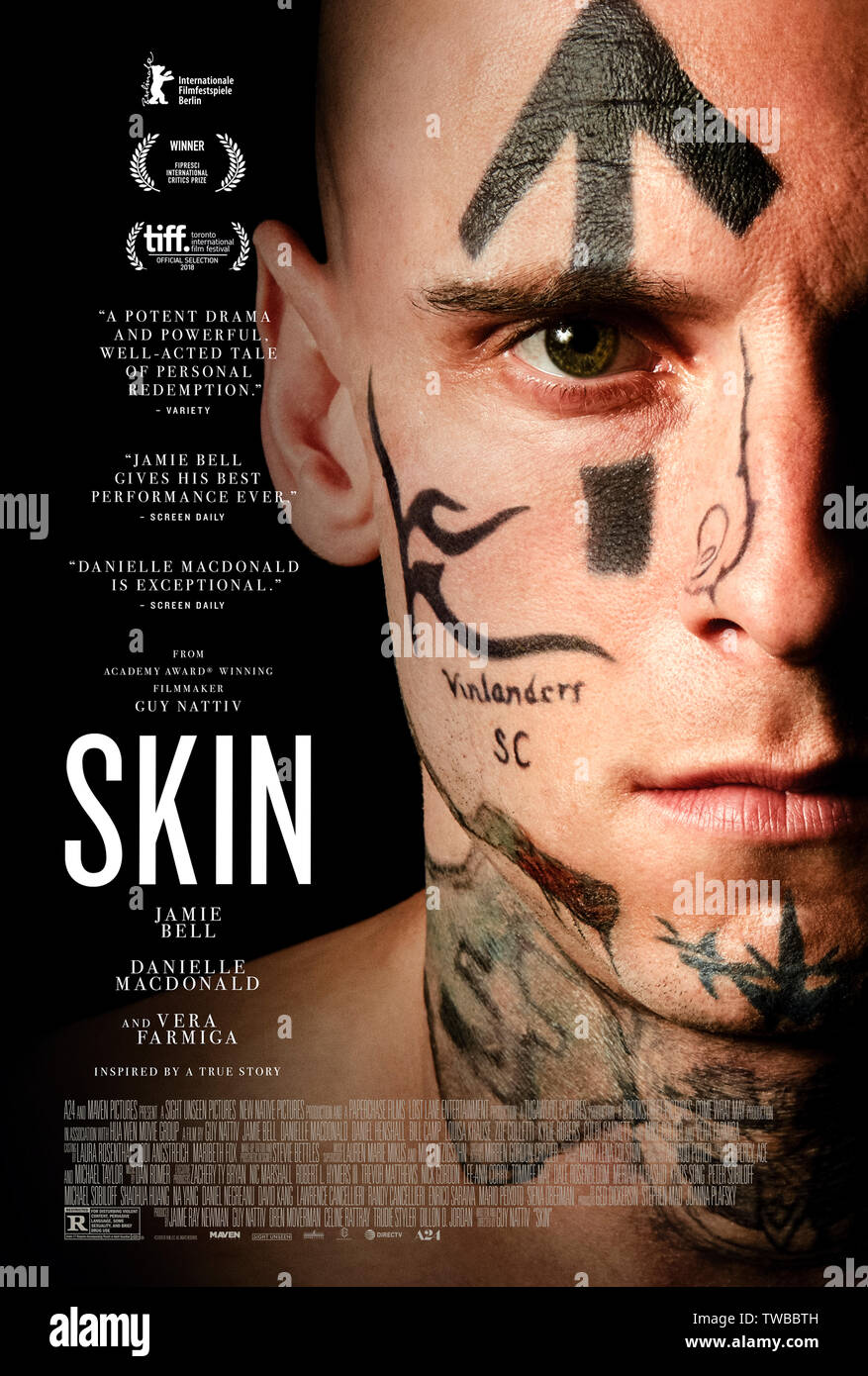 Skin (2018) written and directed by Guy Nattiv and starring Jamie Bell, Danielle Macdonald and Daniel Henshall. Based on the true story of Bryon Widner who turned his back on his racist and white supremacist upbringing. Stock Photo