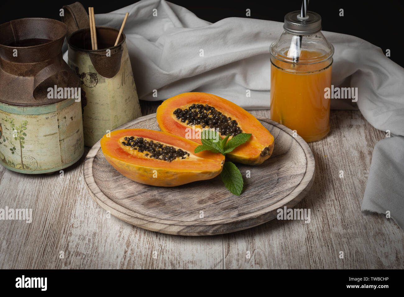 Papaya juice in rustic atmosphere Stock Photo