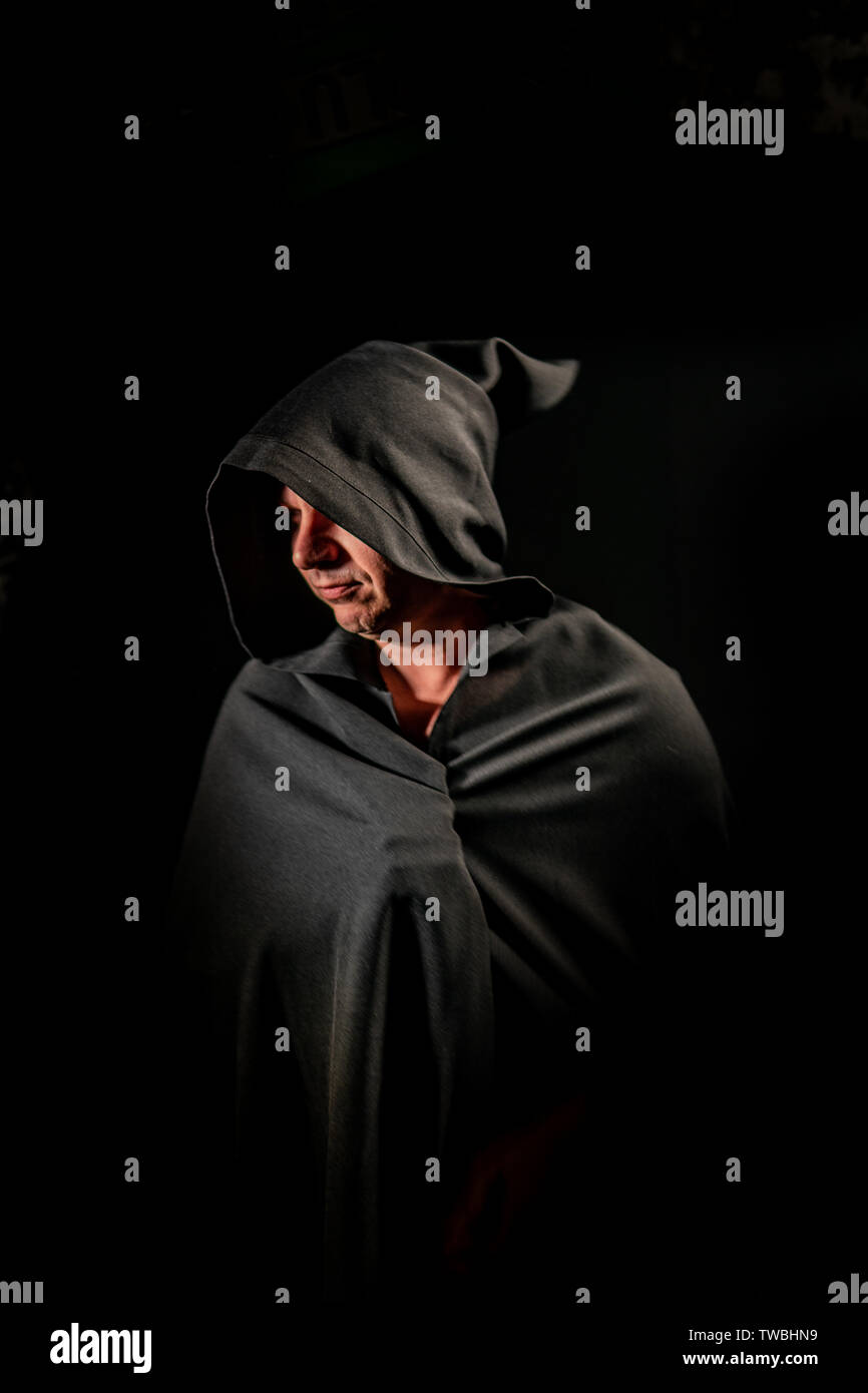 Black cloak hi-res stock photography and images - Alamy