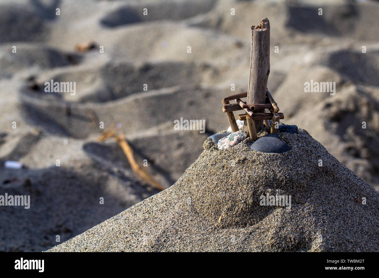 Playing in the sand on a beach Stock Photo