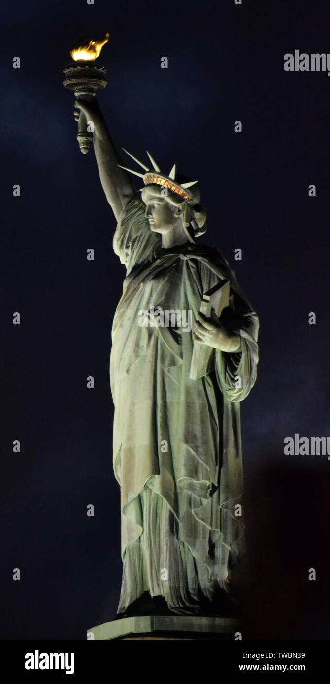 Statue of Liberty in New York at night Stock Photo