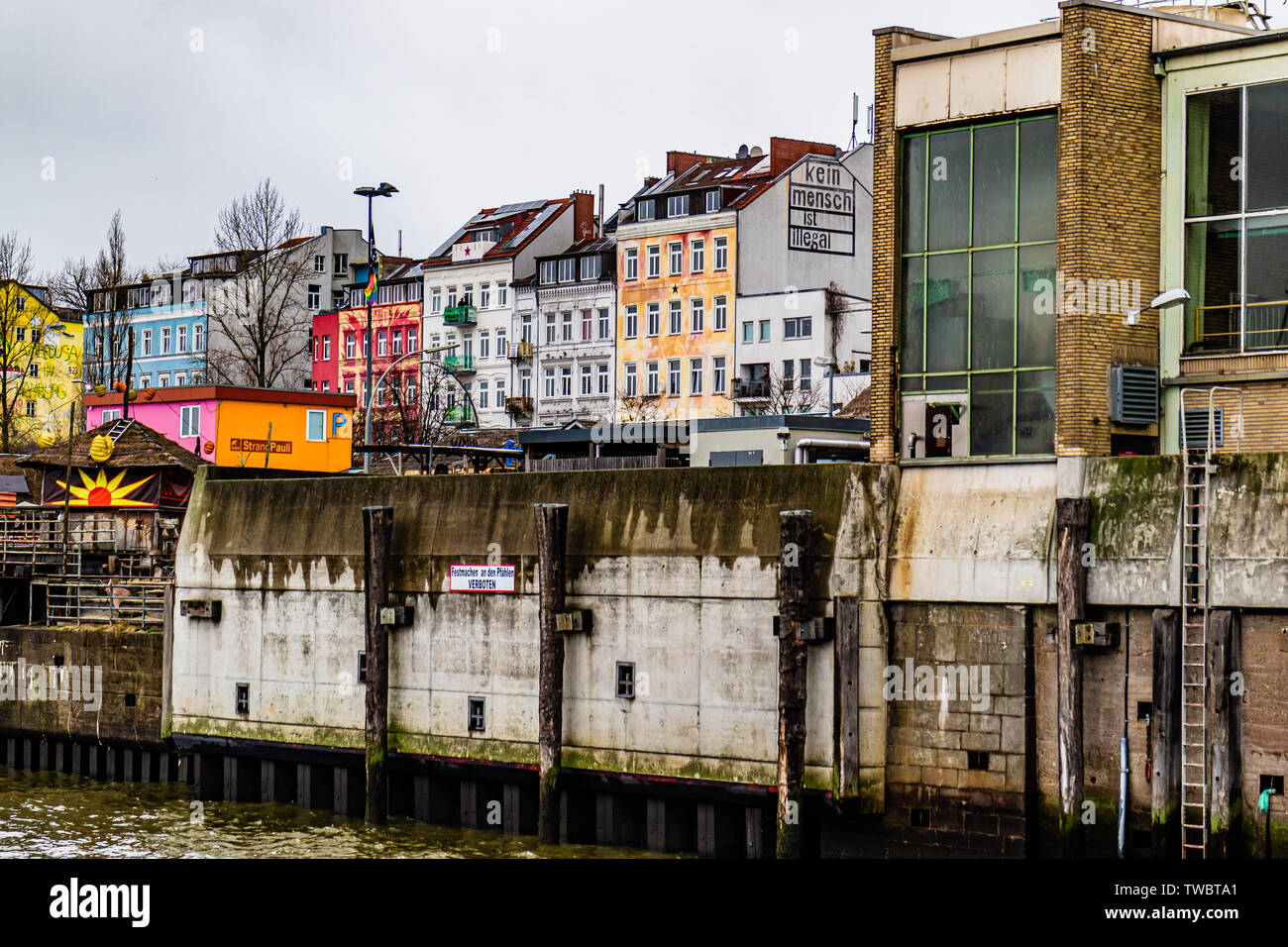 Buildings with graffiti and street art beside the River Elbe in St Pauli, Hamburg, Germany. January 2019. Stock Photo