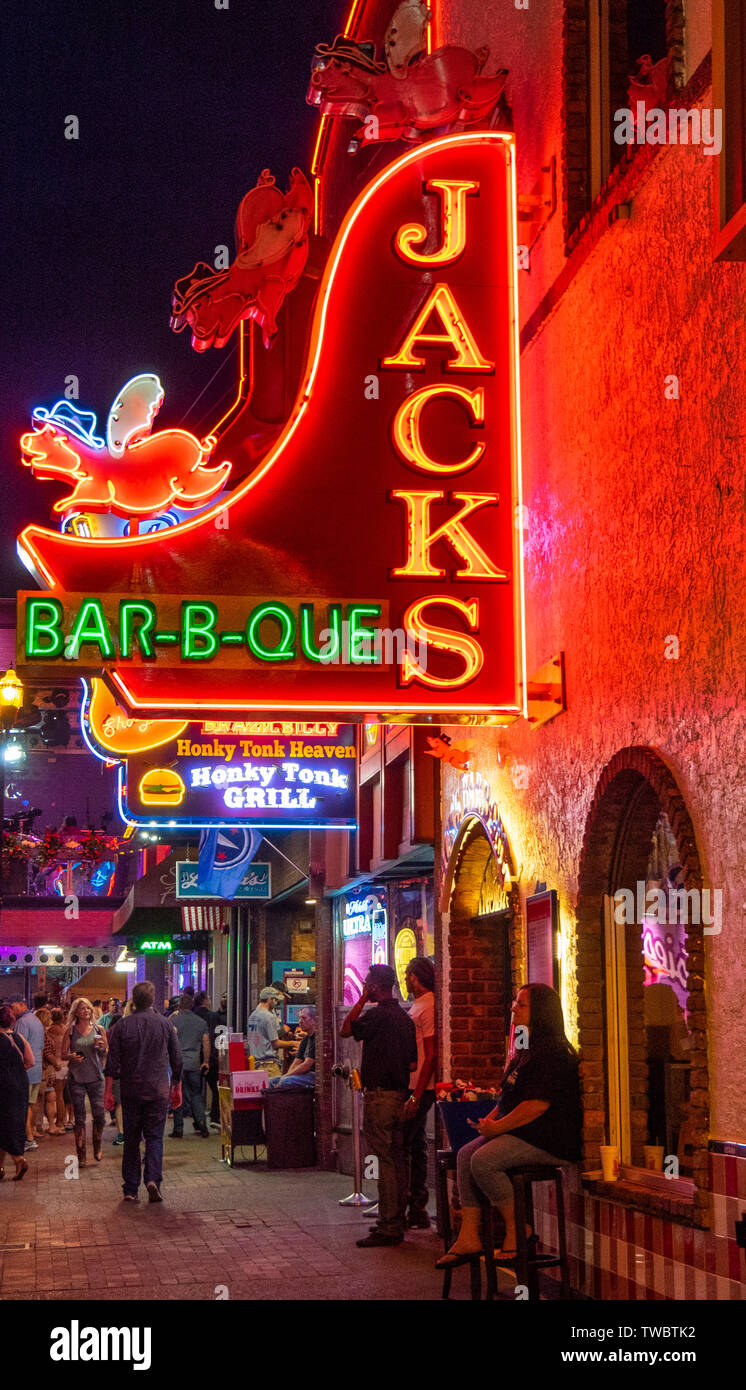 Restaurant bar and concert venue Jacks Bar-B-Que neon sign lit up at night in Broadway Nashville Tennessee USA. Stock Photo