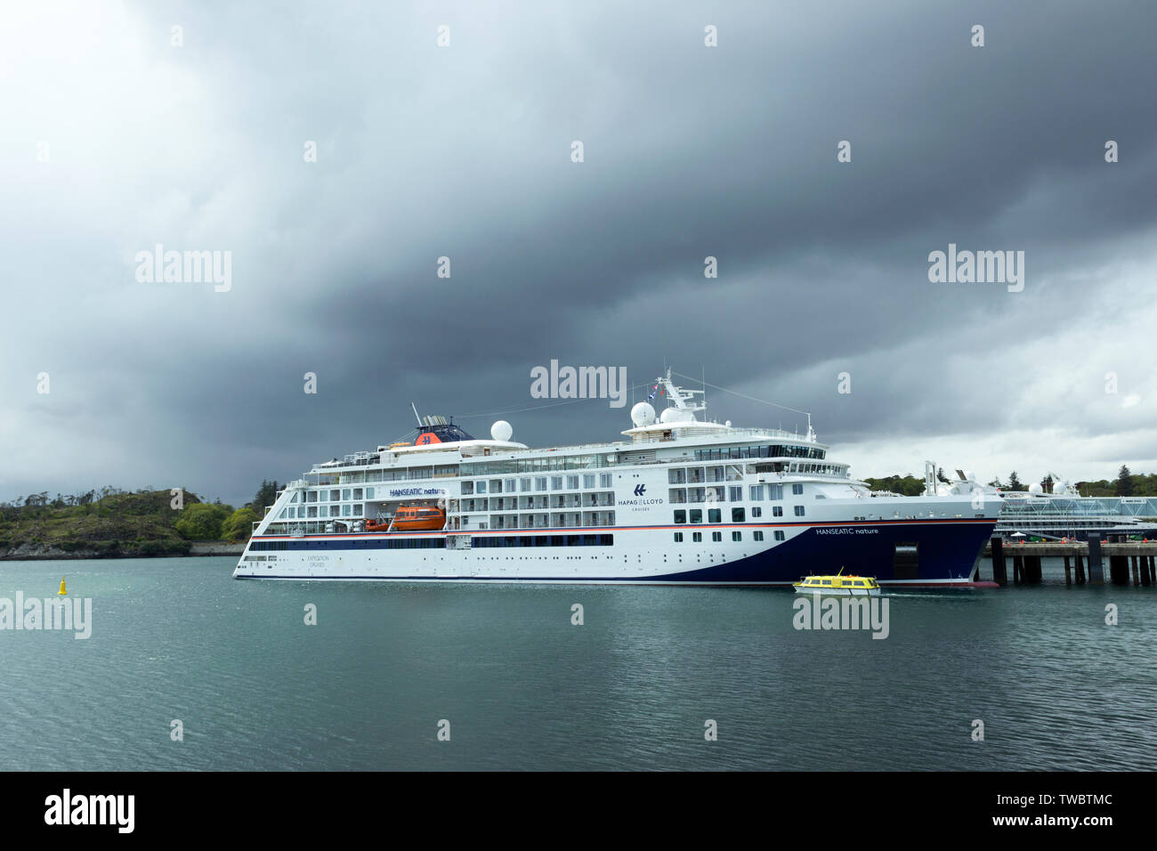 The Cruise Liner MS Hanseatic Nature docked at Stornoway Harbour, Isle of Lewis, Western Isles, Outer Hebrides, Scotland, United Kingdom Stock Photo