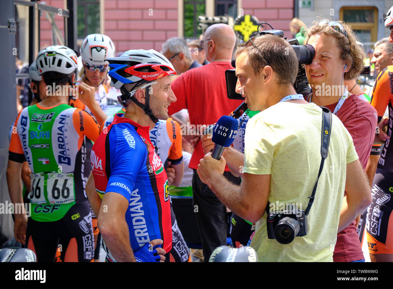 Davide Rebellin of Team Meridiana Kamen being interviewed by RTV SLO prior to departure of Tour of Slovenia stage one race, Ljubljana, Slovenia - June Stock Photo