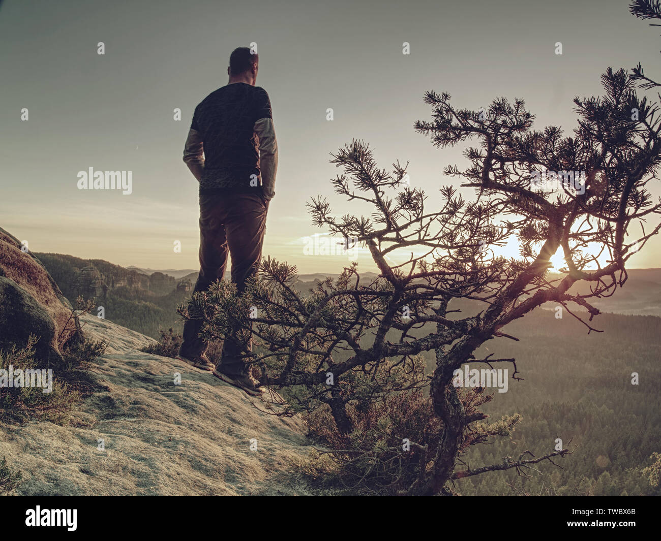 Silhouette of man deep thinking with hands in pocket. Hiker ...