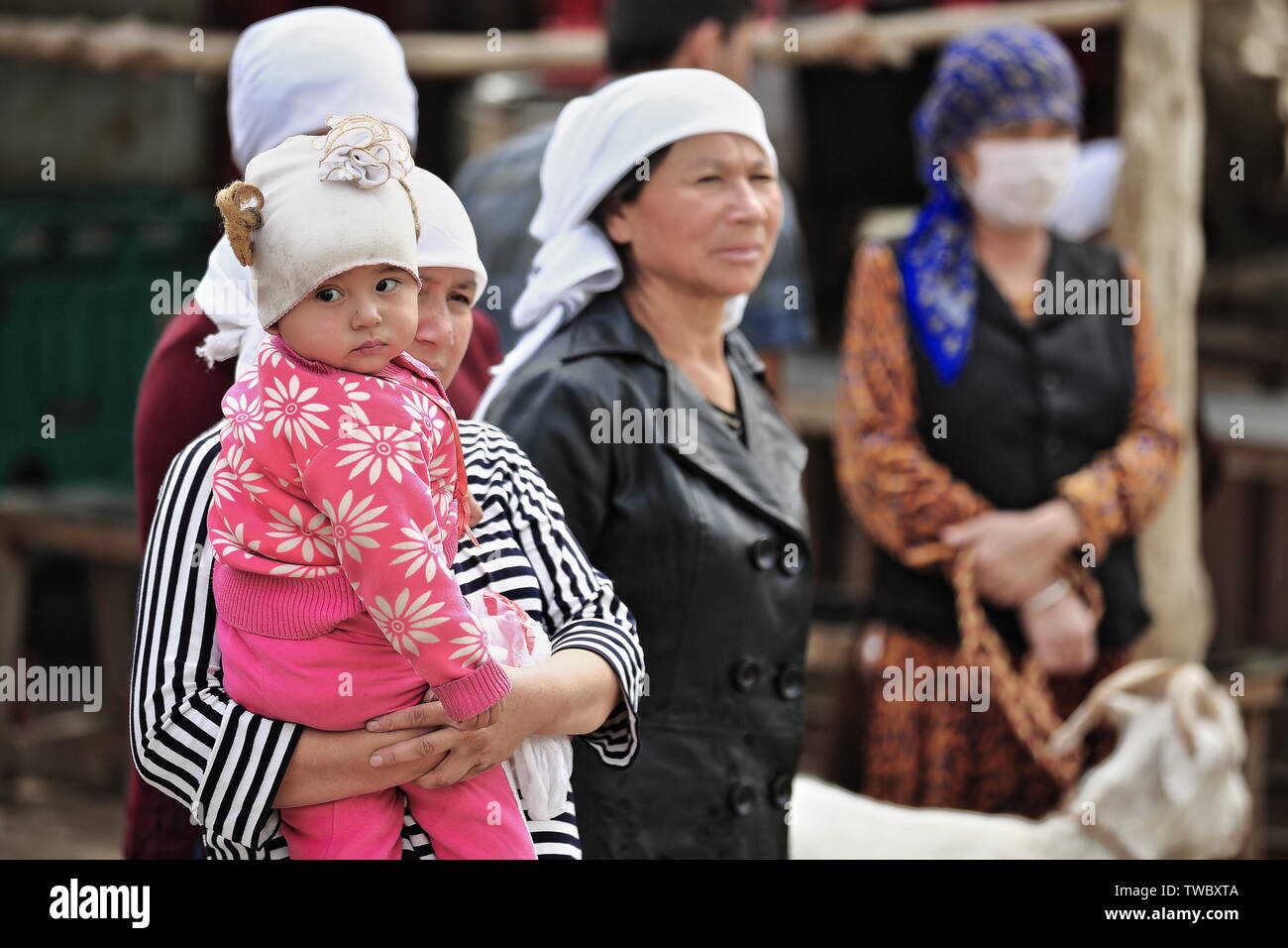 Group Of Uyghur Women Attending The Livestock Market Hotan
