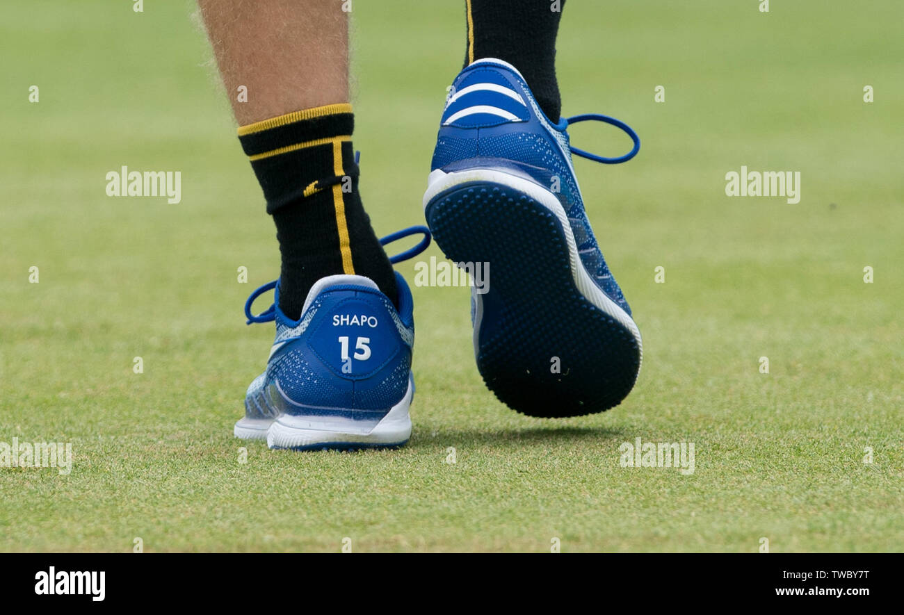London, UK. 19th June, 2019. The nike tennis shoes of Denis Shapovalov of  Canada during Day 3 of the Fever-Tree Tennis Championships 2019 at The  Queen's Club, London, England on 18 June