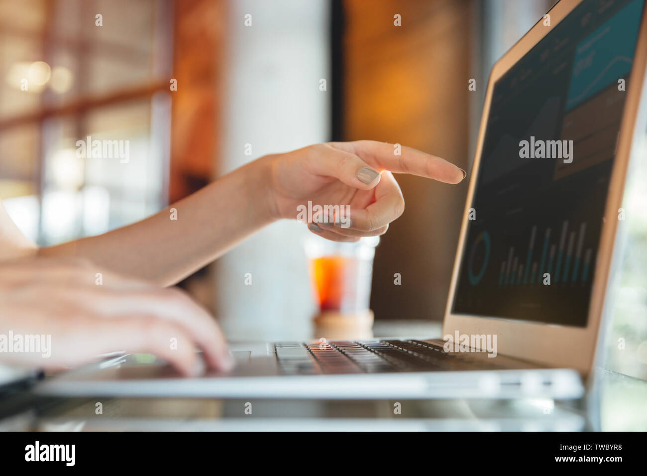 Isolated mockup image of laptop and female hand pointing finger to ...