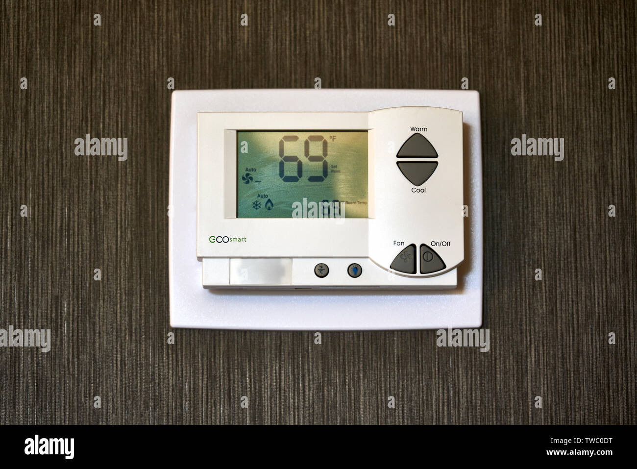 Tarrytown, NY - June 10, 2019: This Eco Smart hotel thermostat by Telkonet has an occupancy sensor for maximum efficiency. Stock Photo