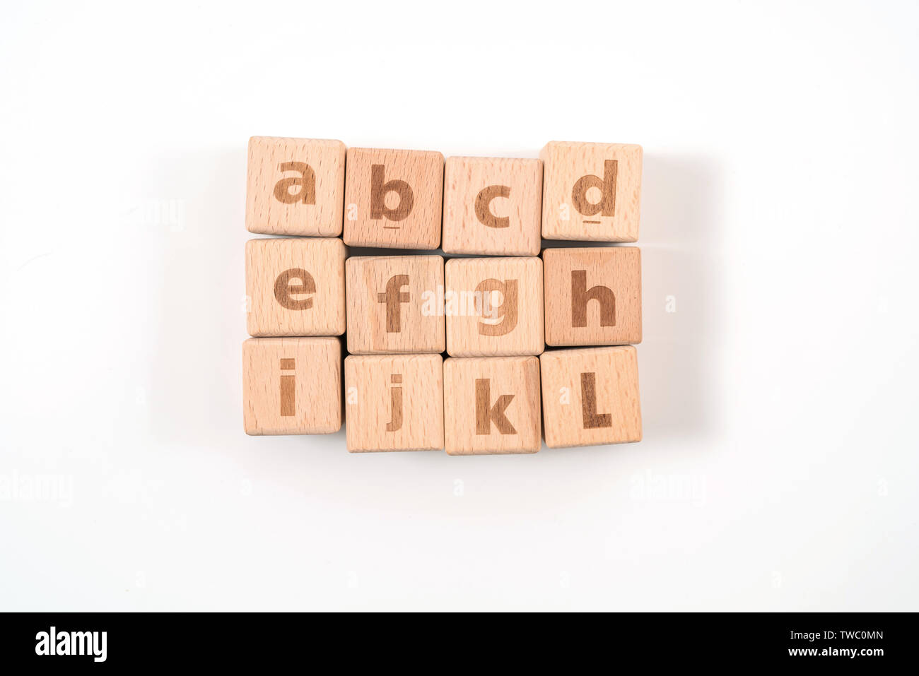 Alphabet on wood ,white background Stock Photo - Alamy