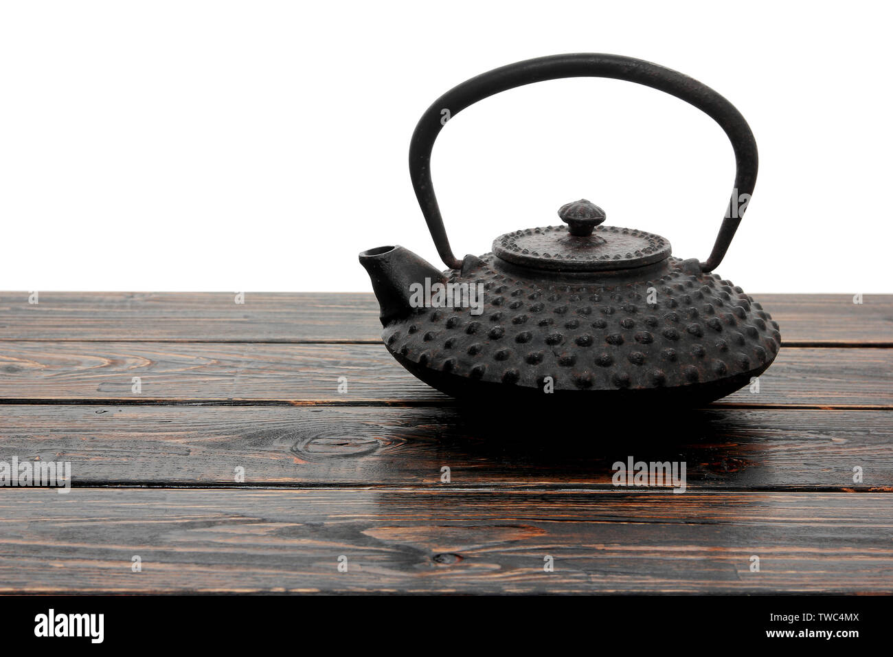 Black Iron Teapot on Wooden Background Stock Photo Alamy