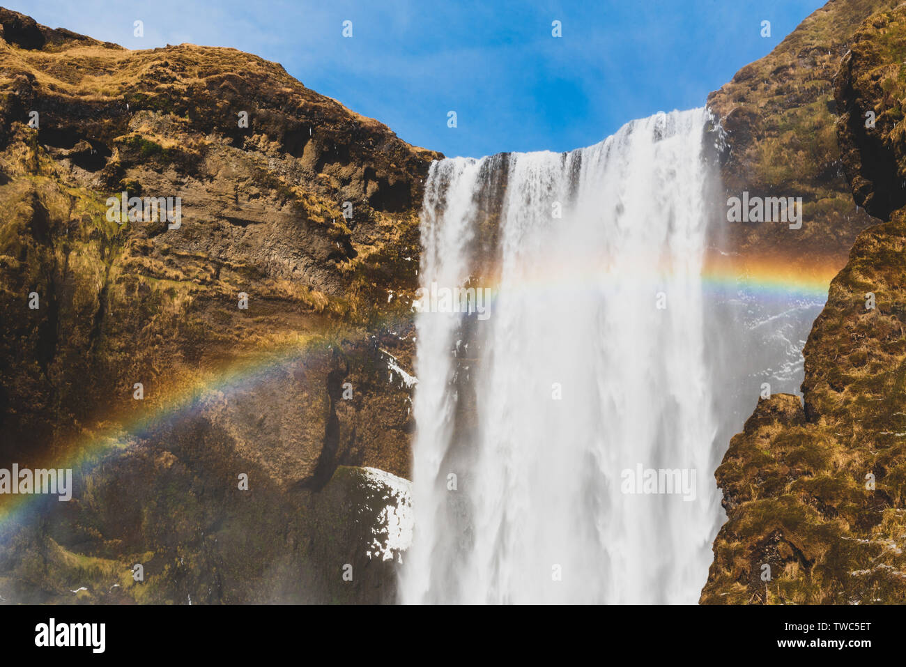 Skogafoss is one of Iceland’s biggest and most beautiful waterfalls with an astounding width of 25 meters and a drop of 60 meters, located in South Ic Stock Photo