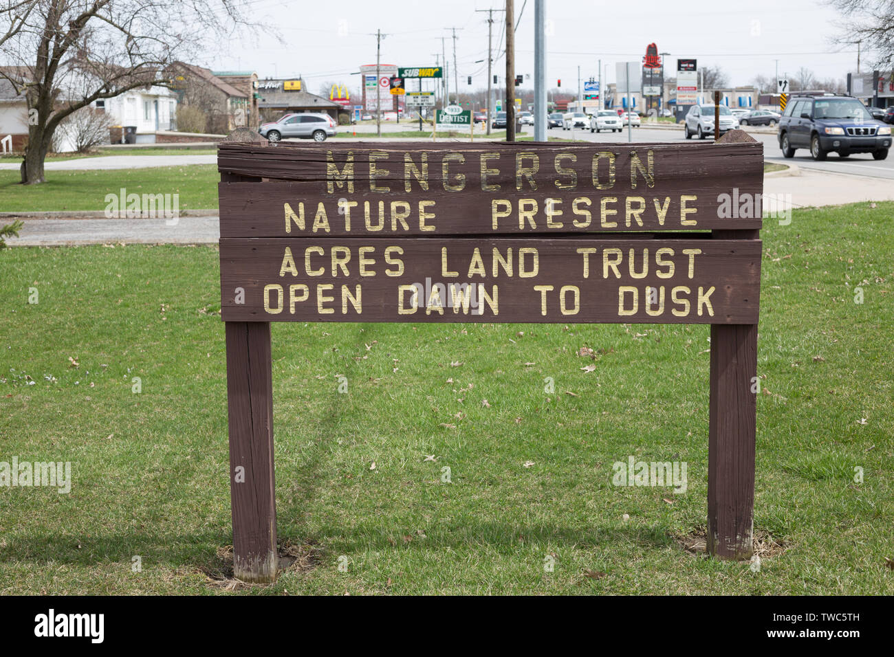 A weathered sign marking the Mengerson Nature Preserve on Stellhorn