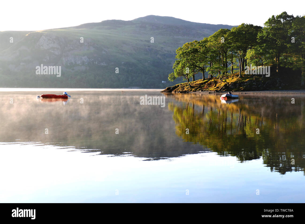 Keswick, Cumbria, UK. June 10, 2019. Morning mist and reflections on