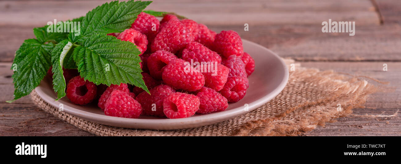 Organic Raspberries Sweets Sweet fresh organic raspberries background close-up. Fresh and sweet ...