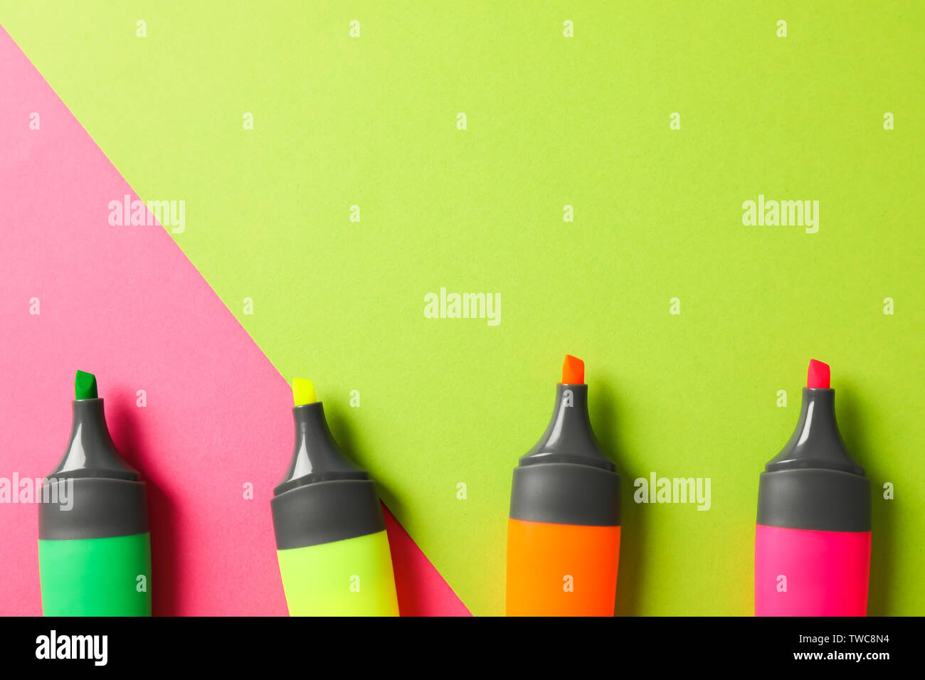 Open highlighters on two tone background, space for text Stock Photo