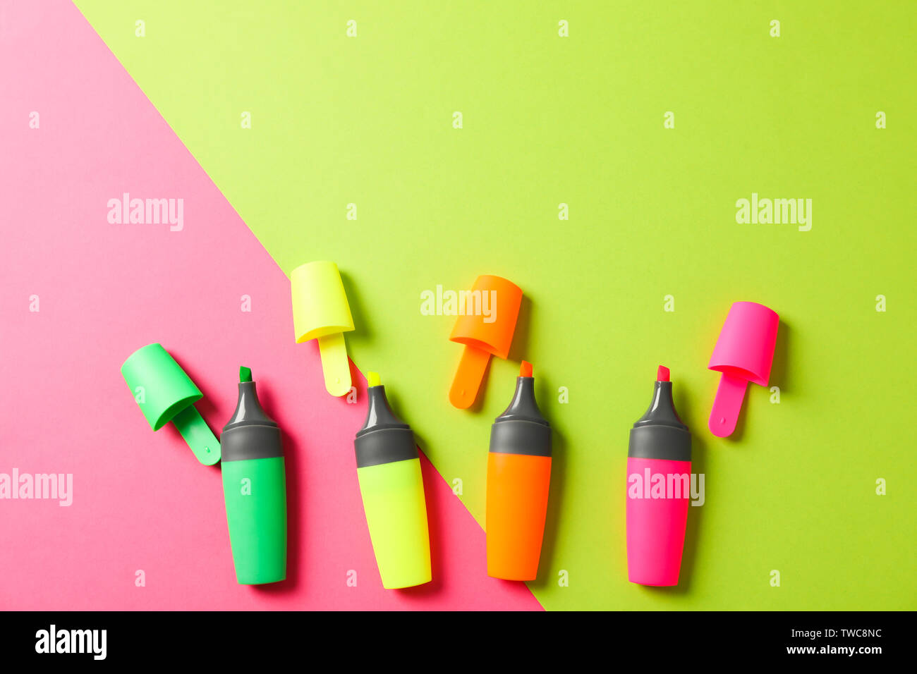 Open highlighters on two tone background, space for text Stock Photo