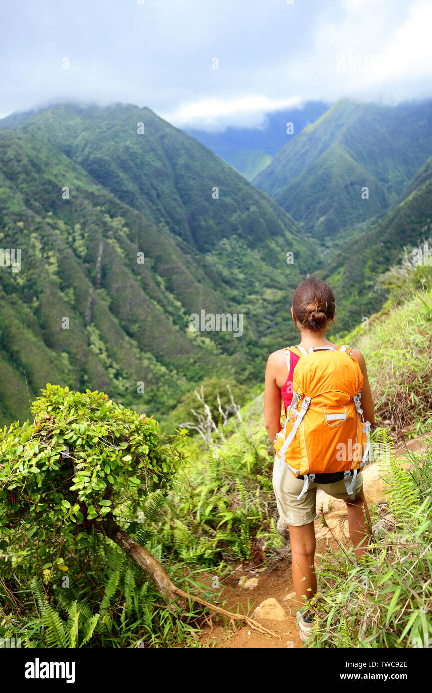 Hiking woman on Hawaii, Waihee ridge trail, Maui, USA. Young female ...