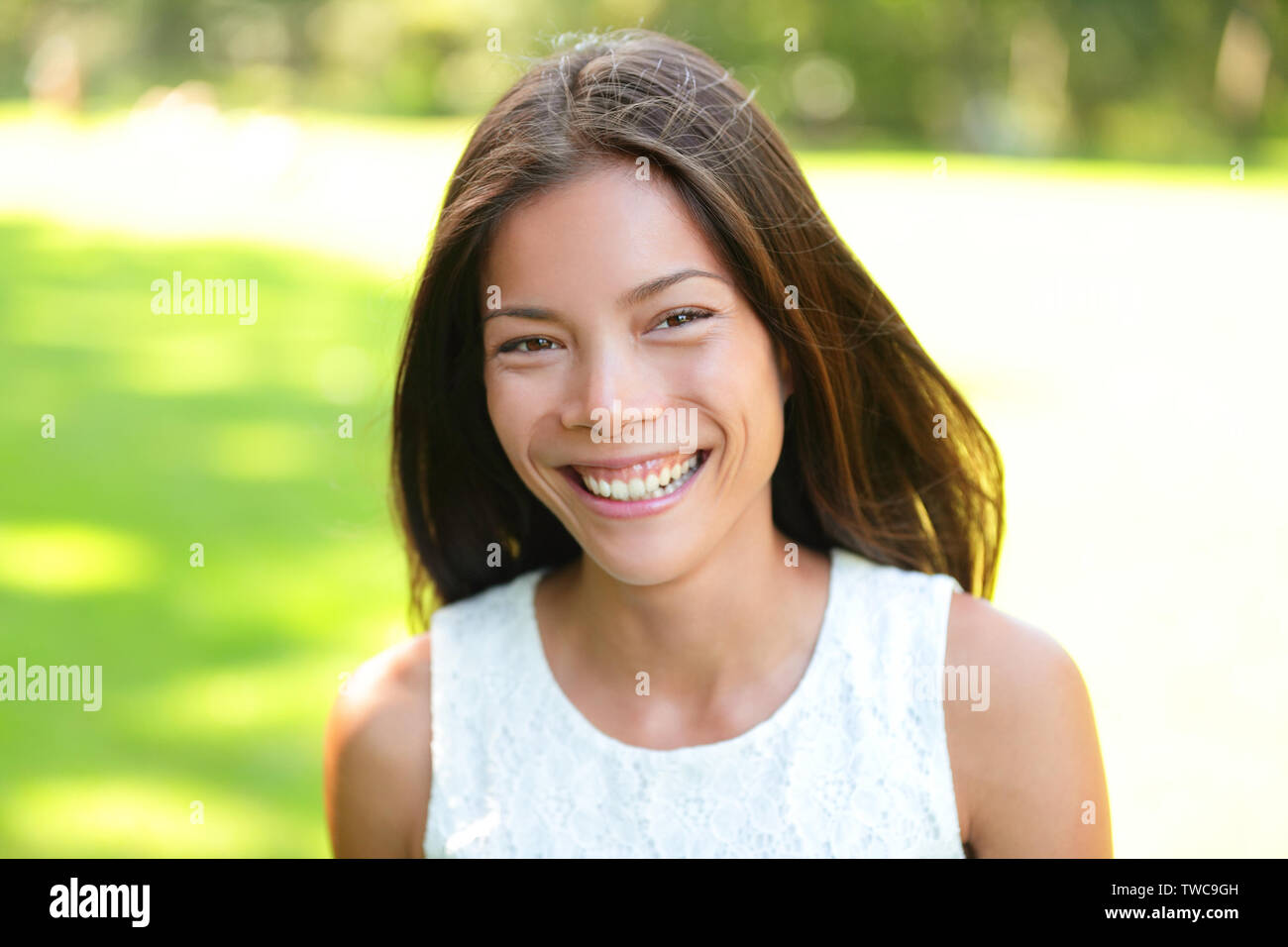 Asian Girl Woman Portrait In Park Smiling Happy Mixed Race Asian Caucasian Girl In 20s Looking