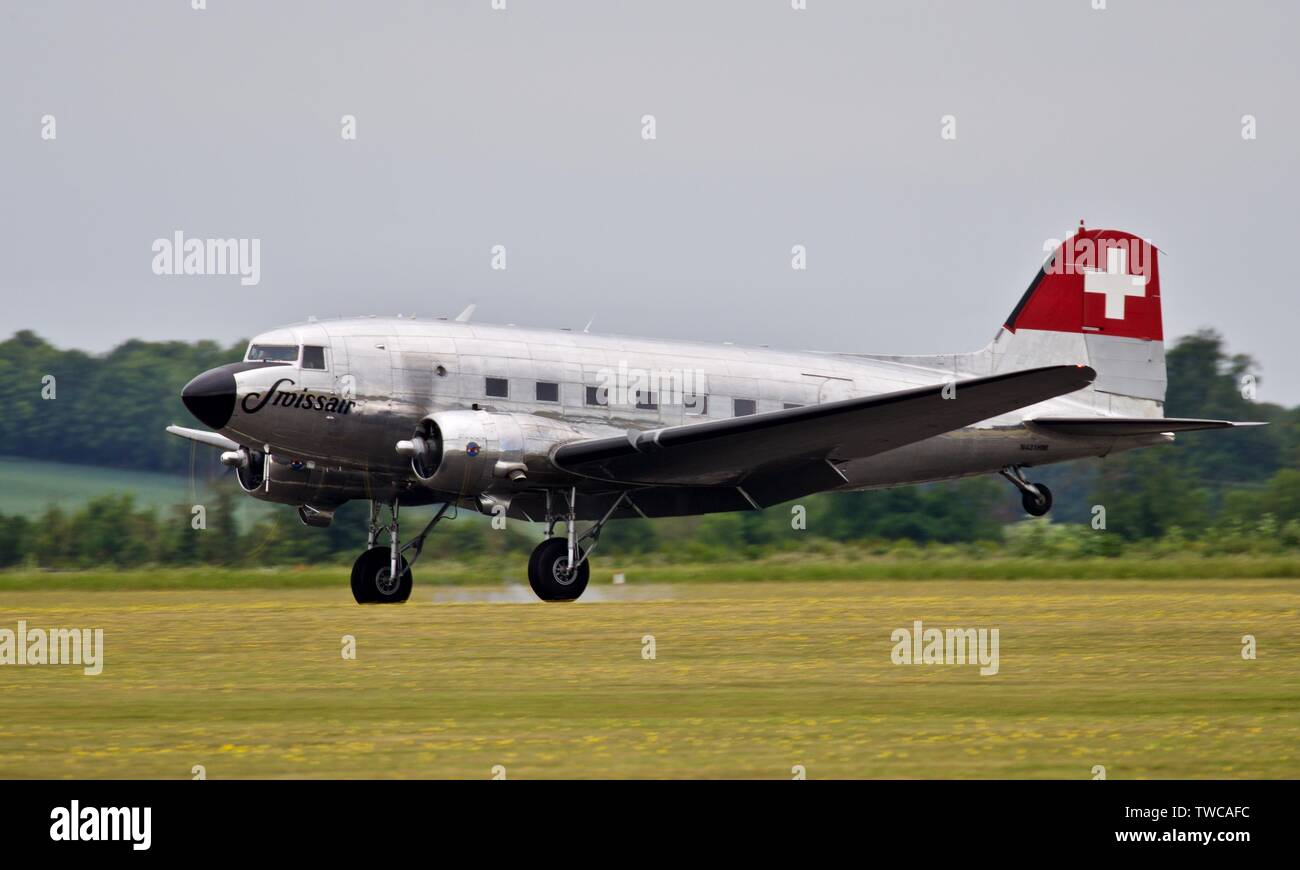 Swissair Douglas DC-3C at the Daks over Normandy airshow on the 4th June 2019 to commemorate the 75th anniversary of D-Day Stock Photo